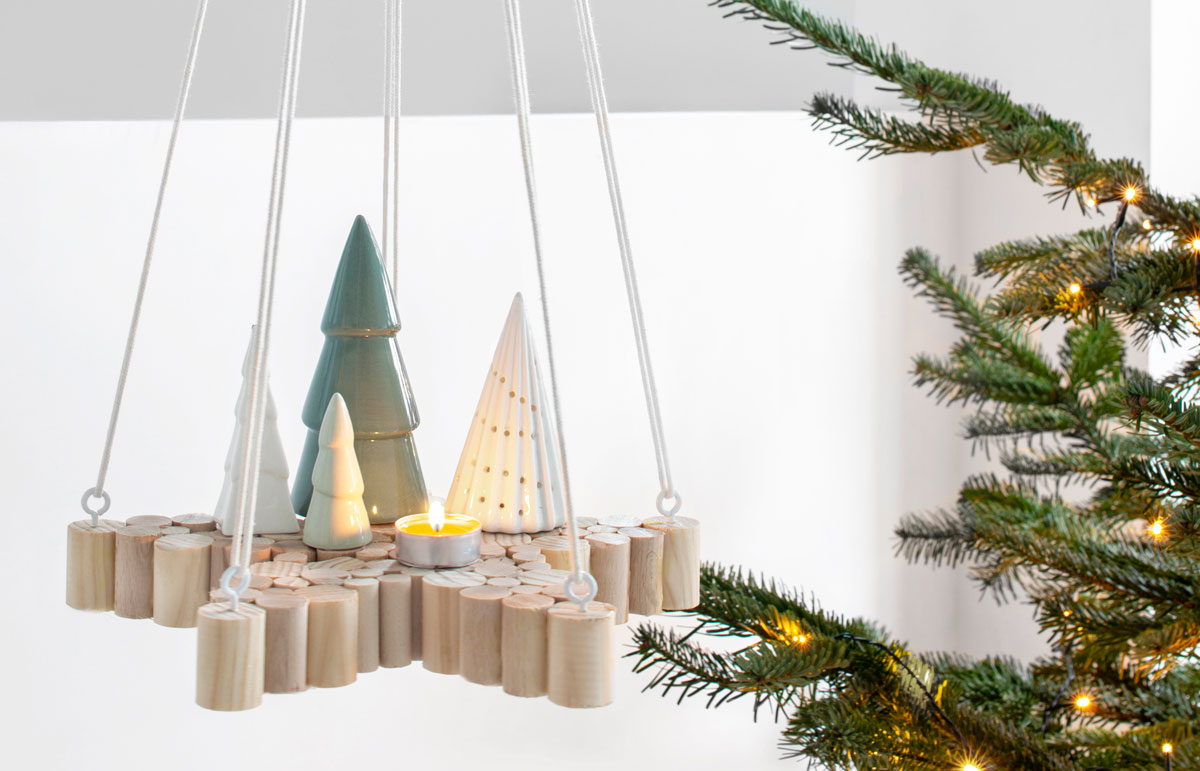 Kerst DIY: een hangende ster van houten stokken Tanja van Hoogdalem